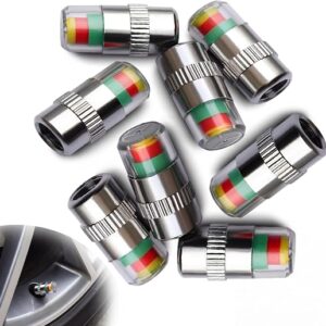 Tire pressure valve caps in chrome with a green indicator window fitted to a car wheel valve