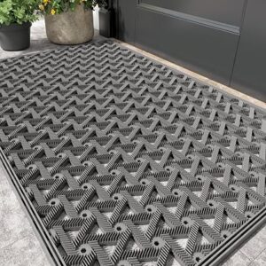 Outdoor door mat with deep drainage grooves at a front entrance