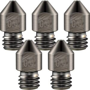 hardened steel nozzle set of five 0.4 mm MK8 nozzles on a workbench