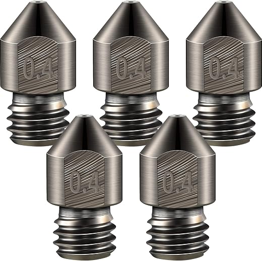 hardened steel nozzle set of five 0.4 mm MK8 nozzles on a workbench